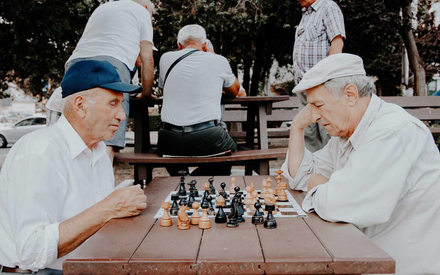 Old men playing chess.